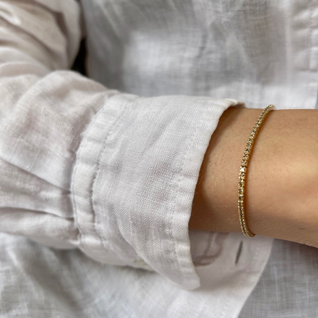 Aligned, TENNIS 0,80ct/1,25mm-17,5cm, Gold/Champagne