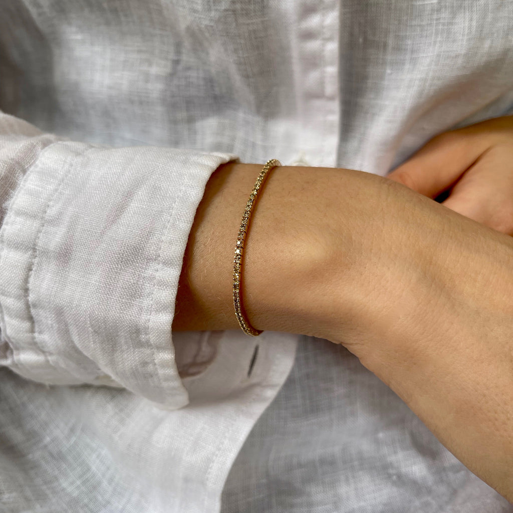 Aligned, TENNIS 0,85ct/1,25mm-19cm, Gold/Champagne