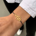 SNEAKY SNAKES, Twirling Bracelet