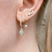 ALIGNED, EVEN oval huggies 12mm 0,20ct, Gold/White