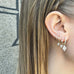 ALIGNED, EVEN oval huggies 12mm 0,20ct, Gold/White