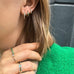 OLYMPIA, E0s Bezel-side huggies, 0,21ct 11mm, Gold/Emerald/Diamonds