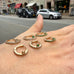OLYMPIA, Eirene Bezel-side huggies, 0,29ct 14mm, Gold/Emerald/Diamonds